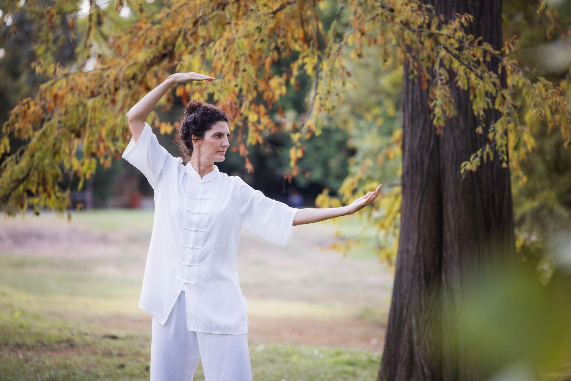 Woman exercising Qi Gong