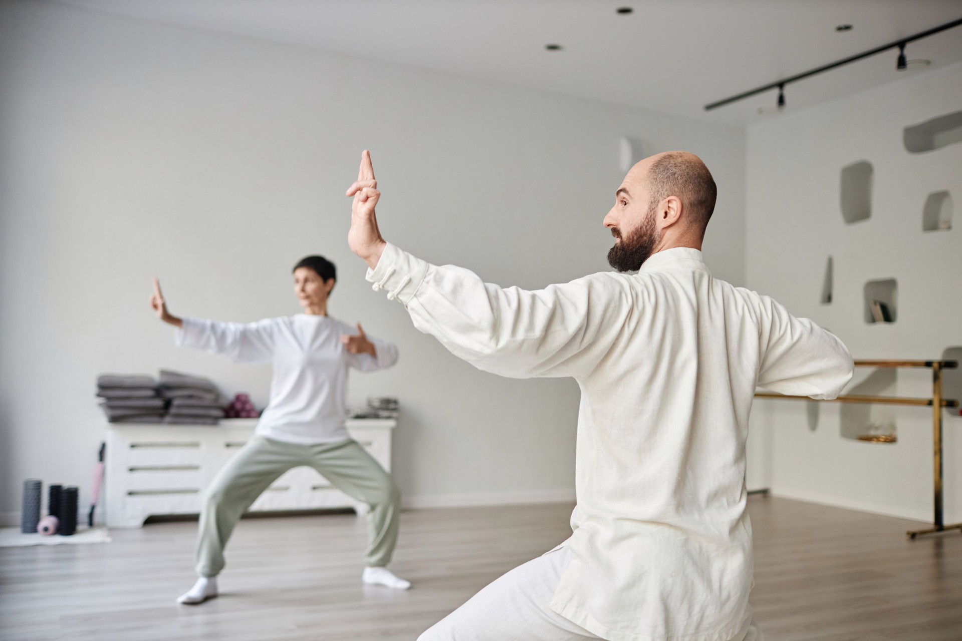 Instructor Showing Archer Pose during Qigong Class